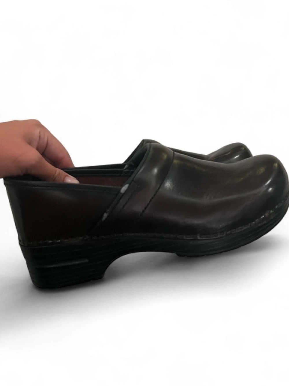 Women’s deep brown glossy dansko leather clogs